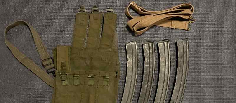 9mm Sterling magazines, pouch, and sling.