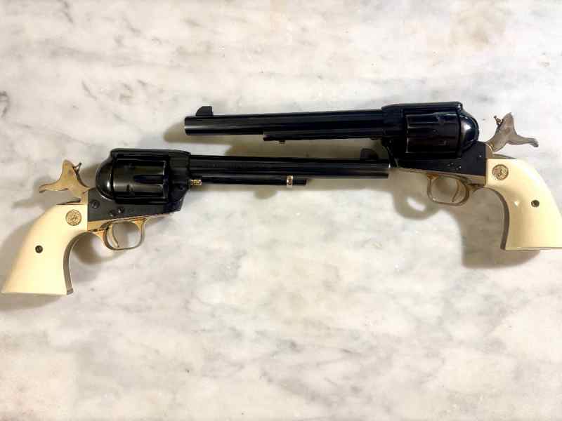 TWO 125th anniversary SAA Colt .45 OBO 