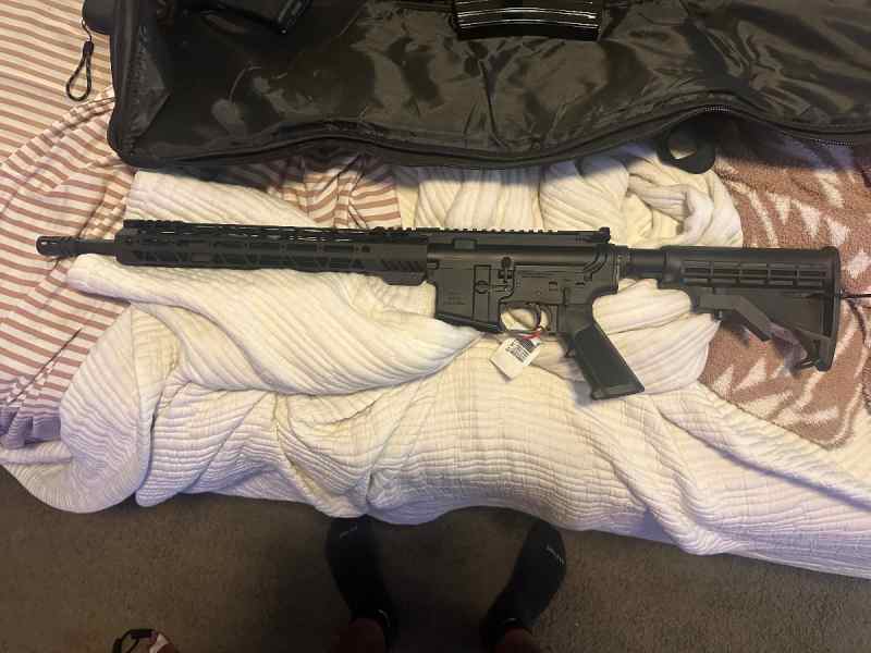 **NEW NEVER FIRED AR15**