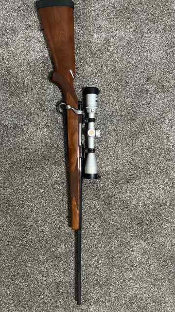 Ruger m77 mark 2 with scope. 