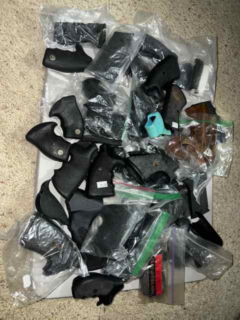 Large lot of pachmyer/hogue/ factory grips