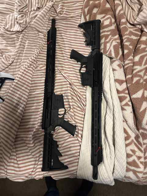 ** 2 BRAND NEW AR 15s** GLOCK TRADES MAYBE