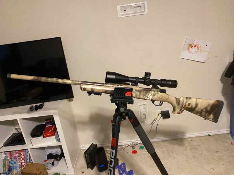 Browning X-bolt W/ Nikon FX1000 Black Scope