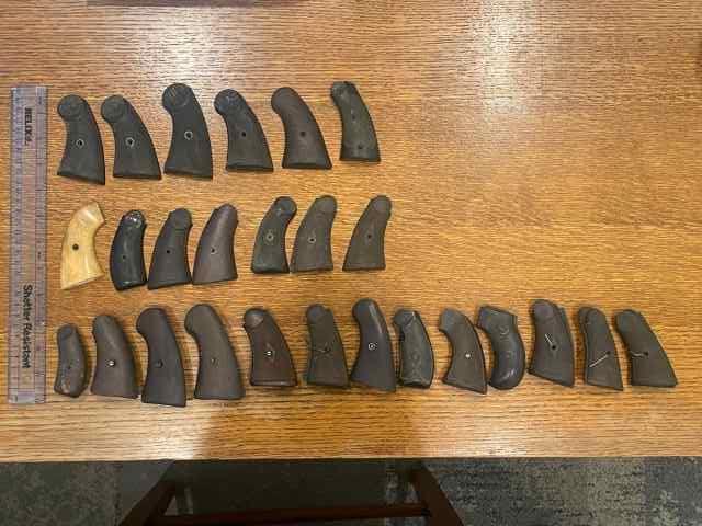 39 Small Revolver Grips - Very old