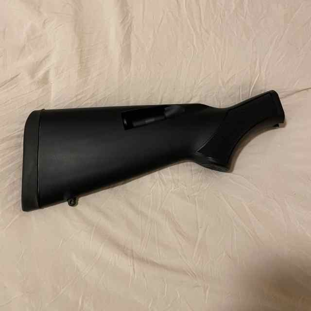 Mossberg 12 Gauge +4 Stock