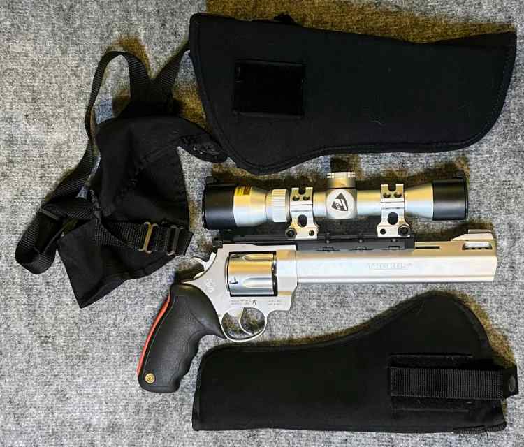 8 3/8in RAGING BULL / Nikon Scope / Holsters 