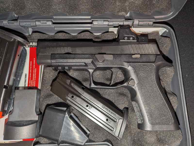 Sig p320 x series full sized 9mm with Sig red dot